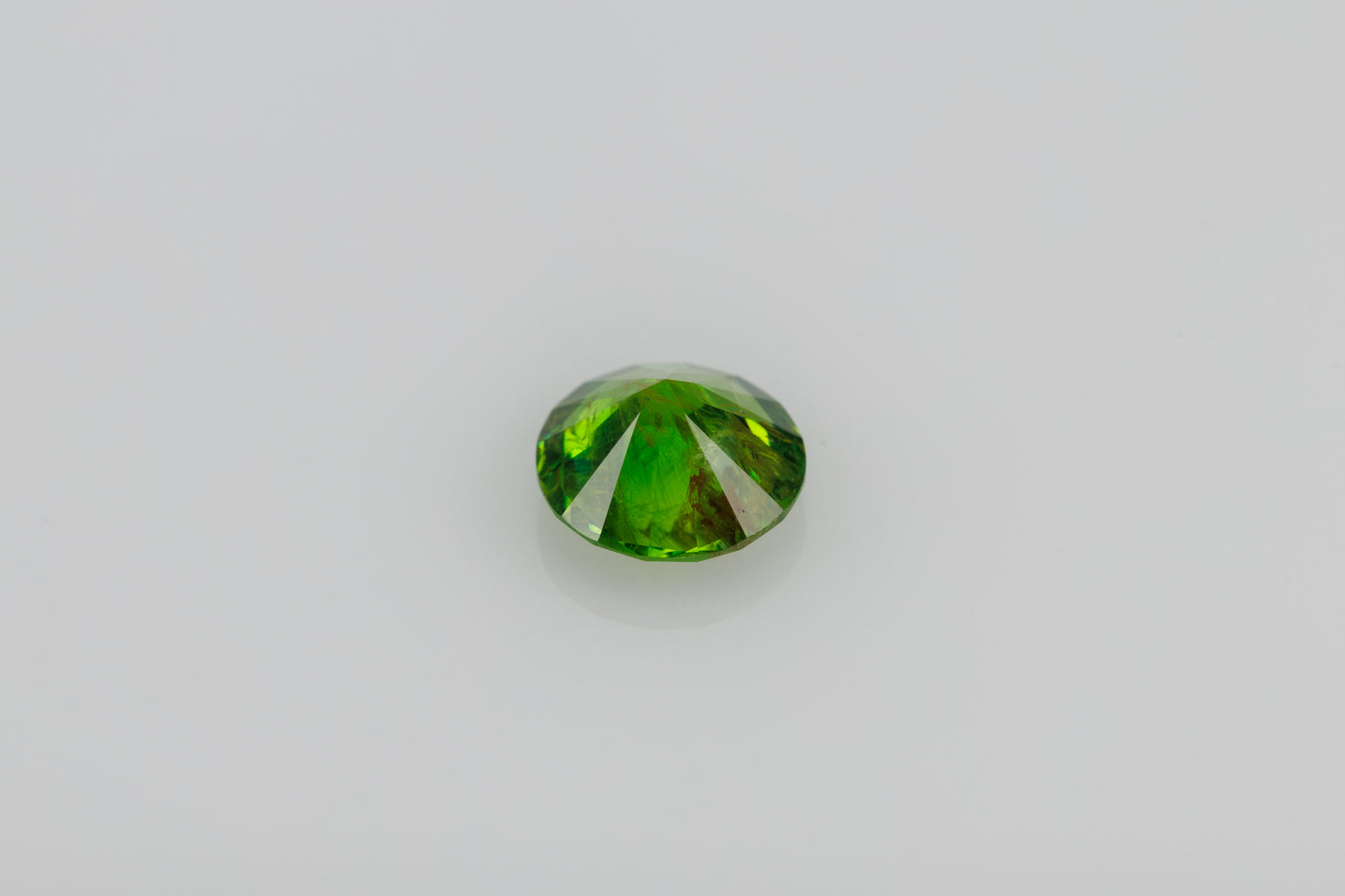 Faceted russian demantoid garnet 0.87 ct