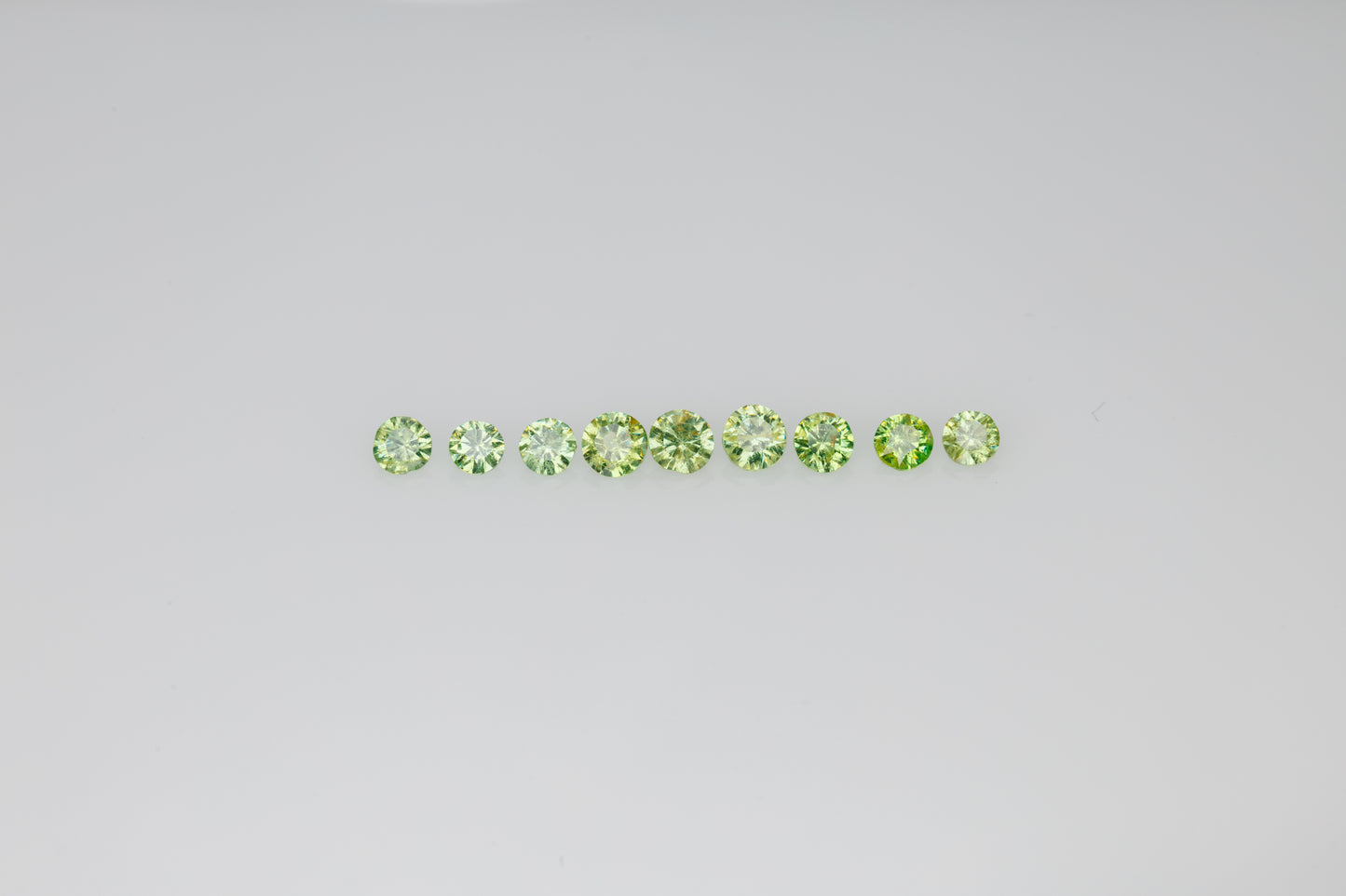 Faceted demantoid garnet set 0.85 ct