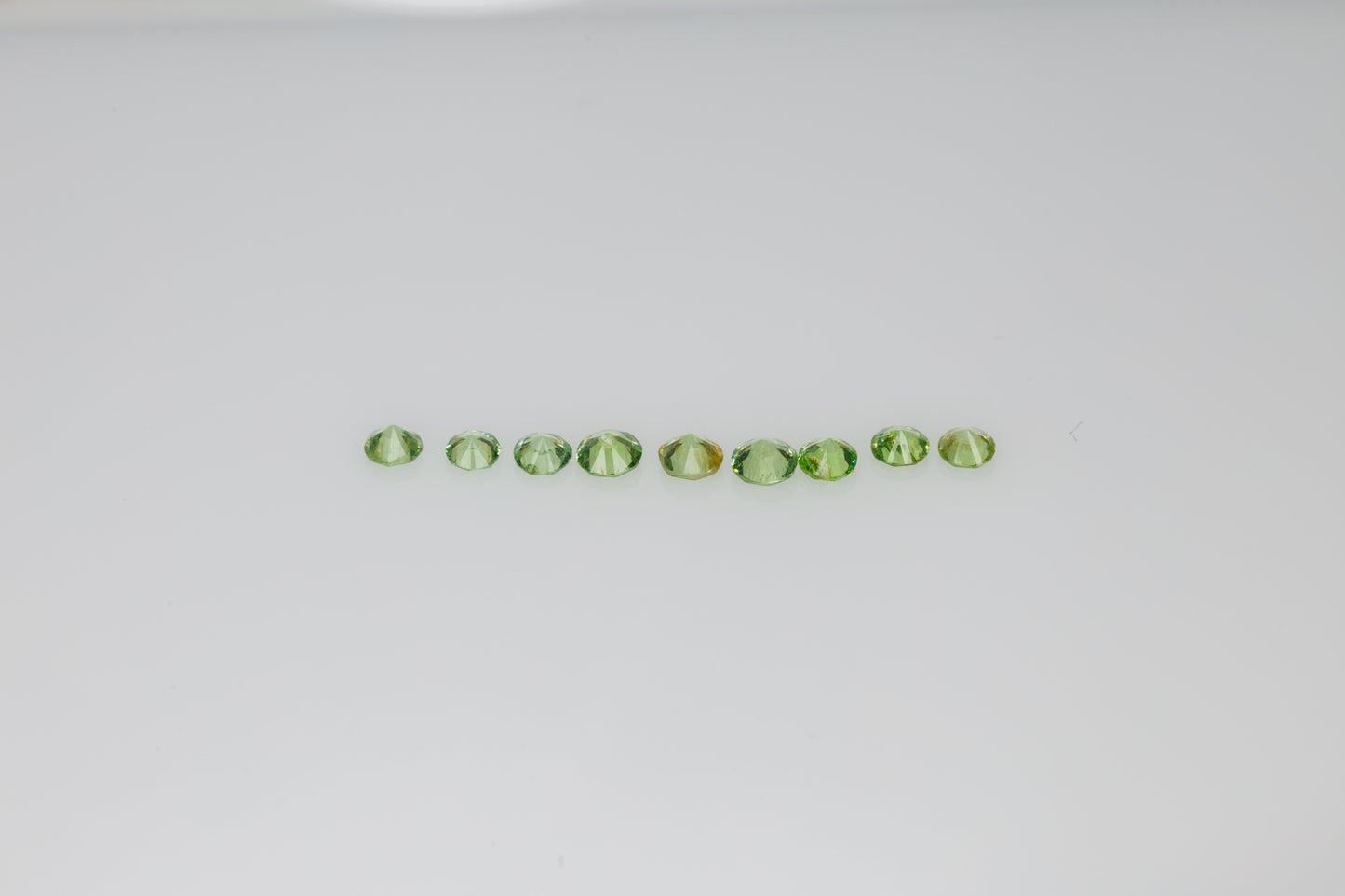 Faceted demantoid garnet set 0.85 ct