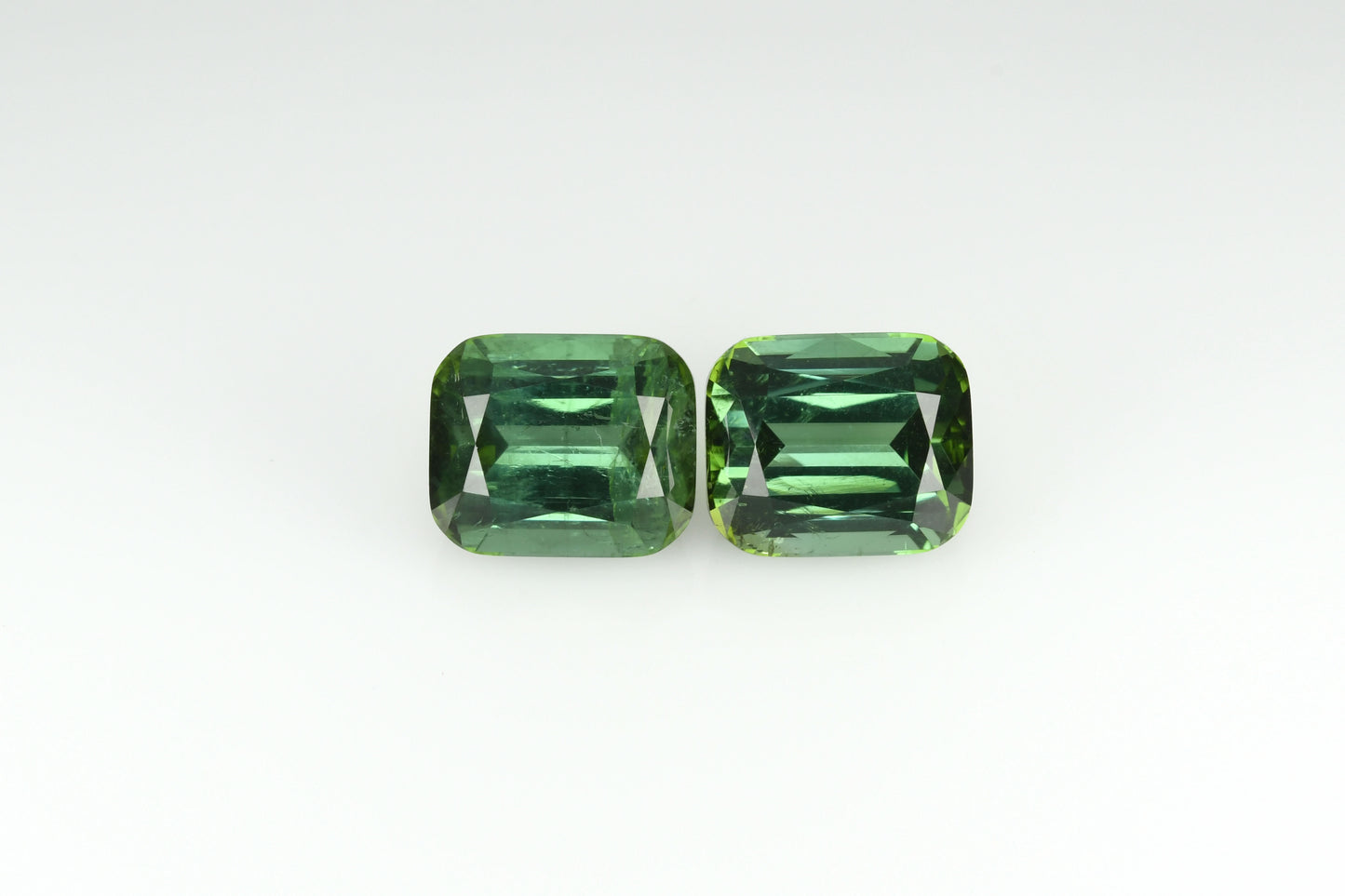 Faceted tourmaline pair, afghan green faceted tourmaline pair 9 ct