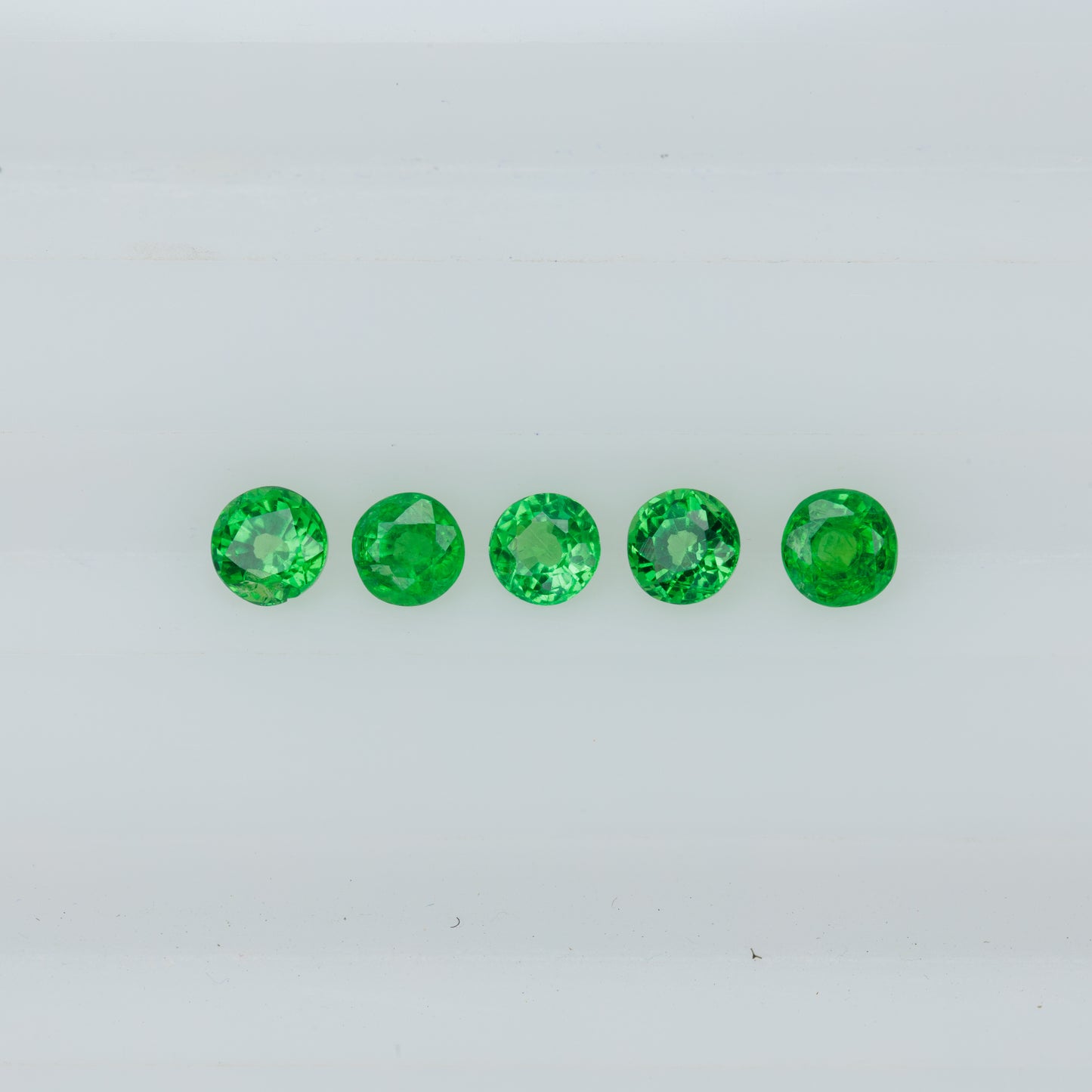 Faceted tsavorite set