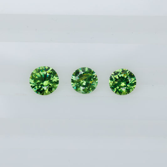 Russian demantoid set, faceted demantoid garnet set 1,64 ct