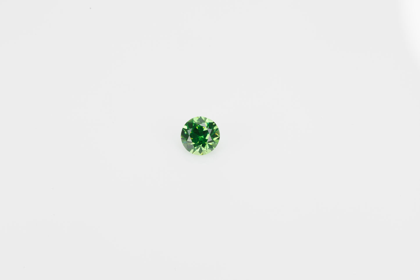 Faceted demantoid garnet, 0.38 ct