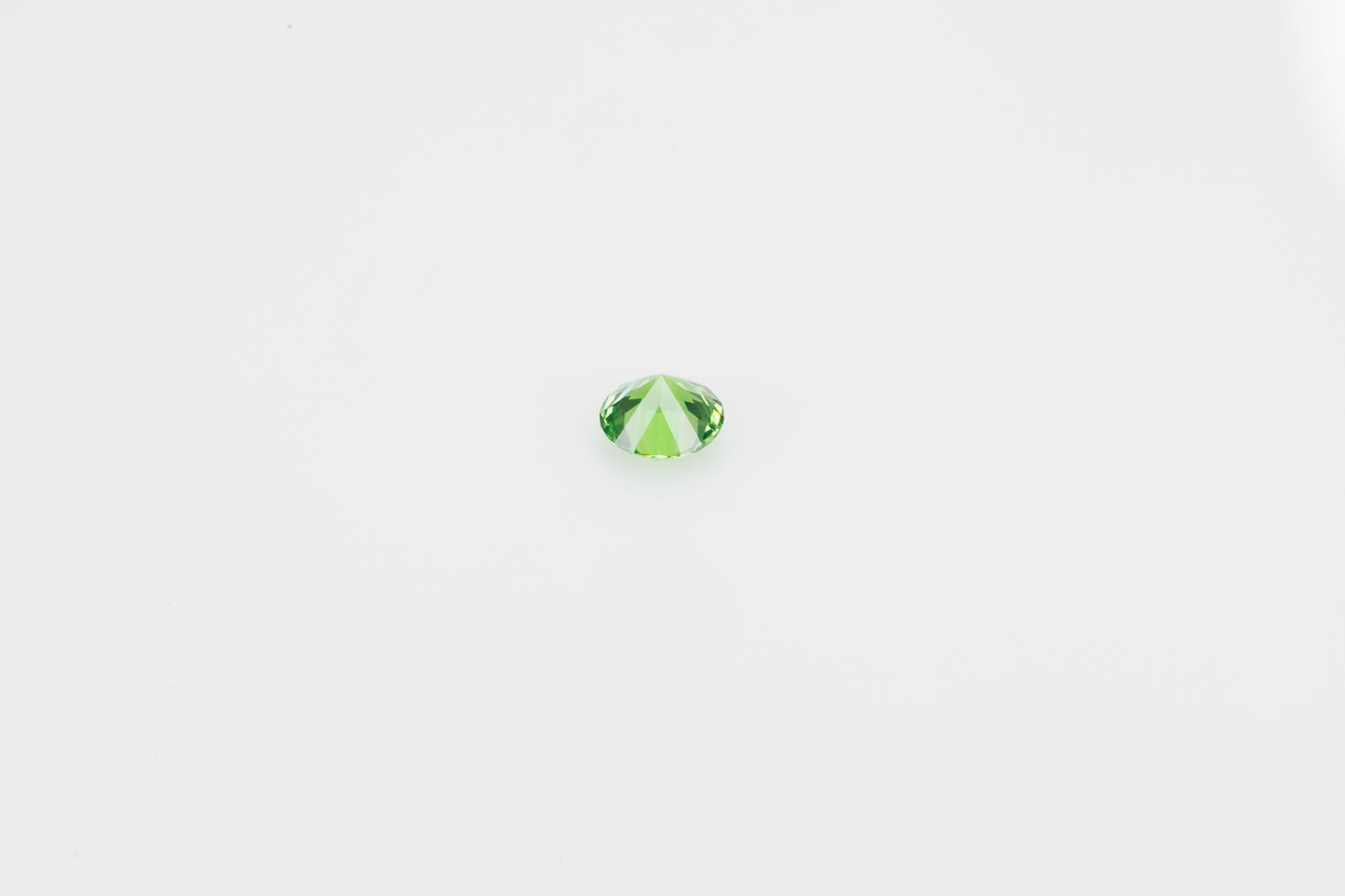 Faceted demantoid garnet, 0.38 ct