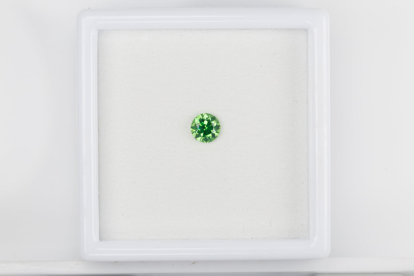 Faceted demantoid garnet, 0.38 ct