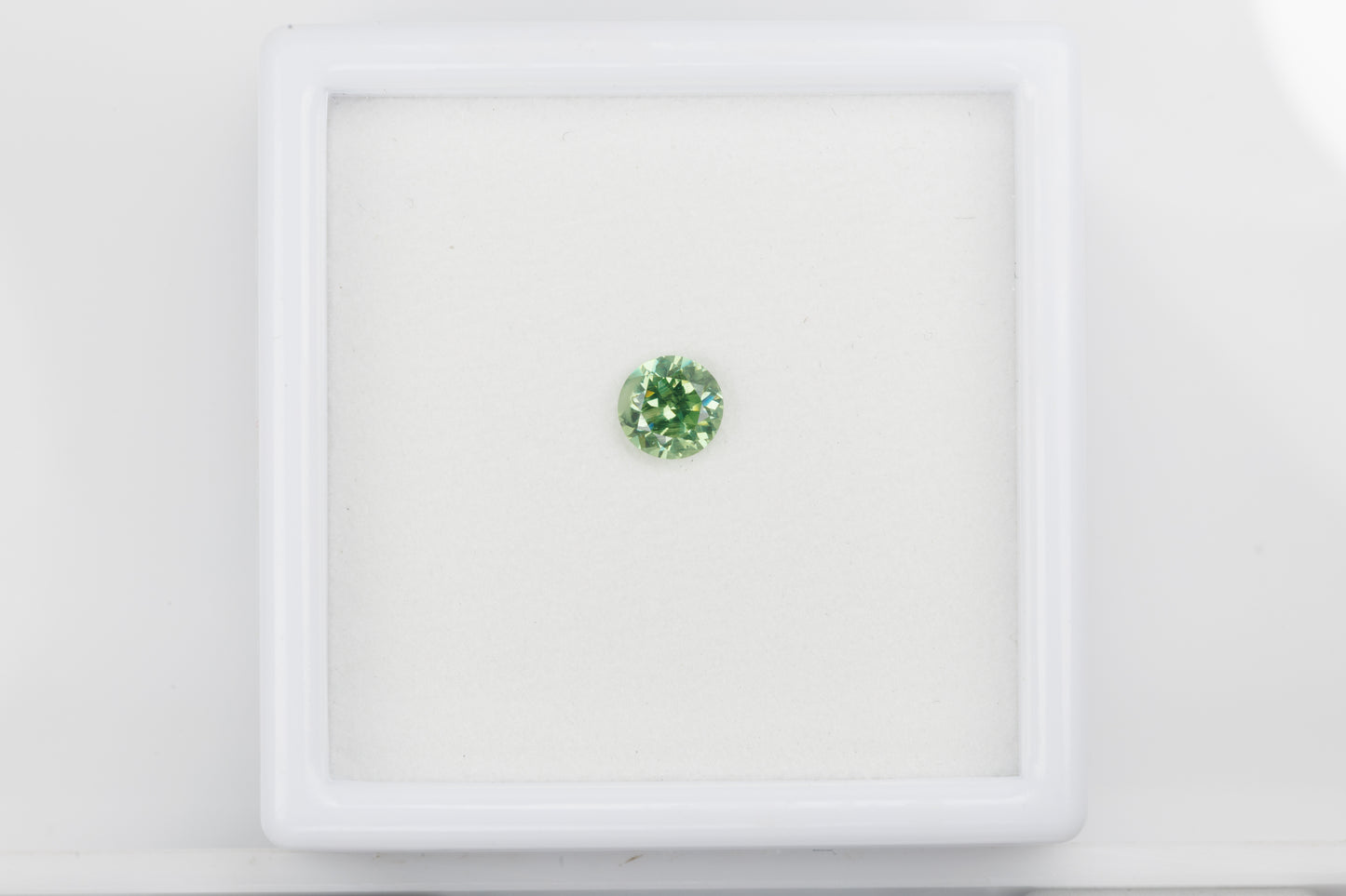 Faceted demantoid garnet, 0.5 ct