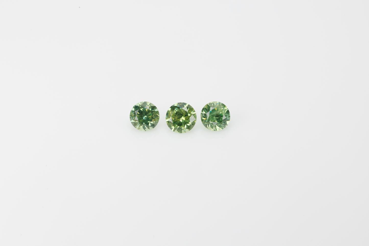 Faceted demantoid set, every stone, 0.93 ct