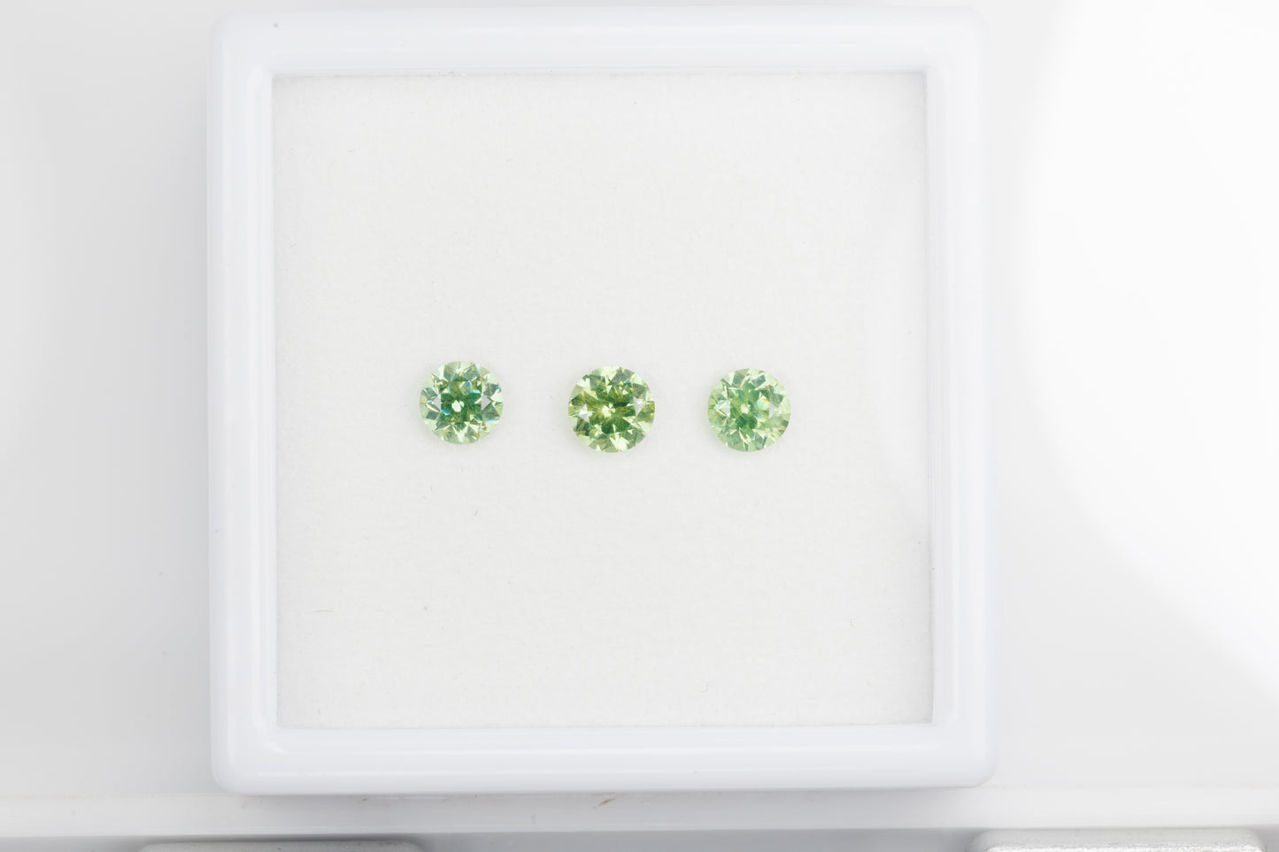 Faceted demantoid set, every stone, 0.93 ct