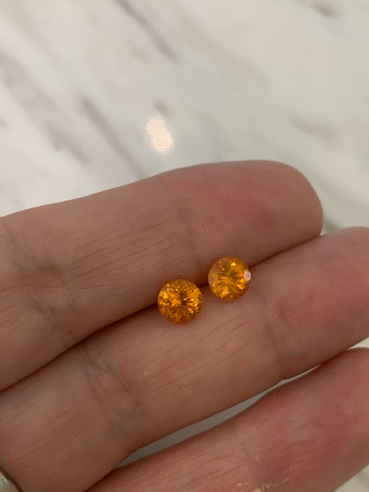 Faceted spessartite pair, 1.8 cts