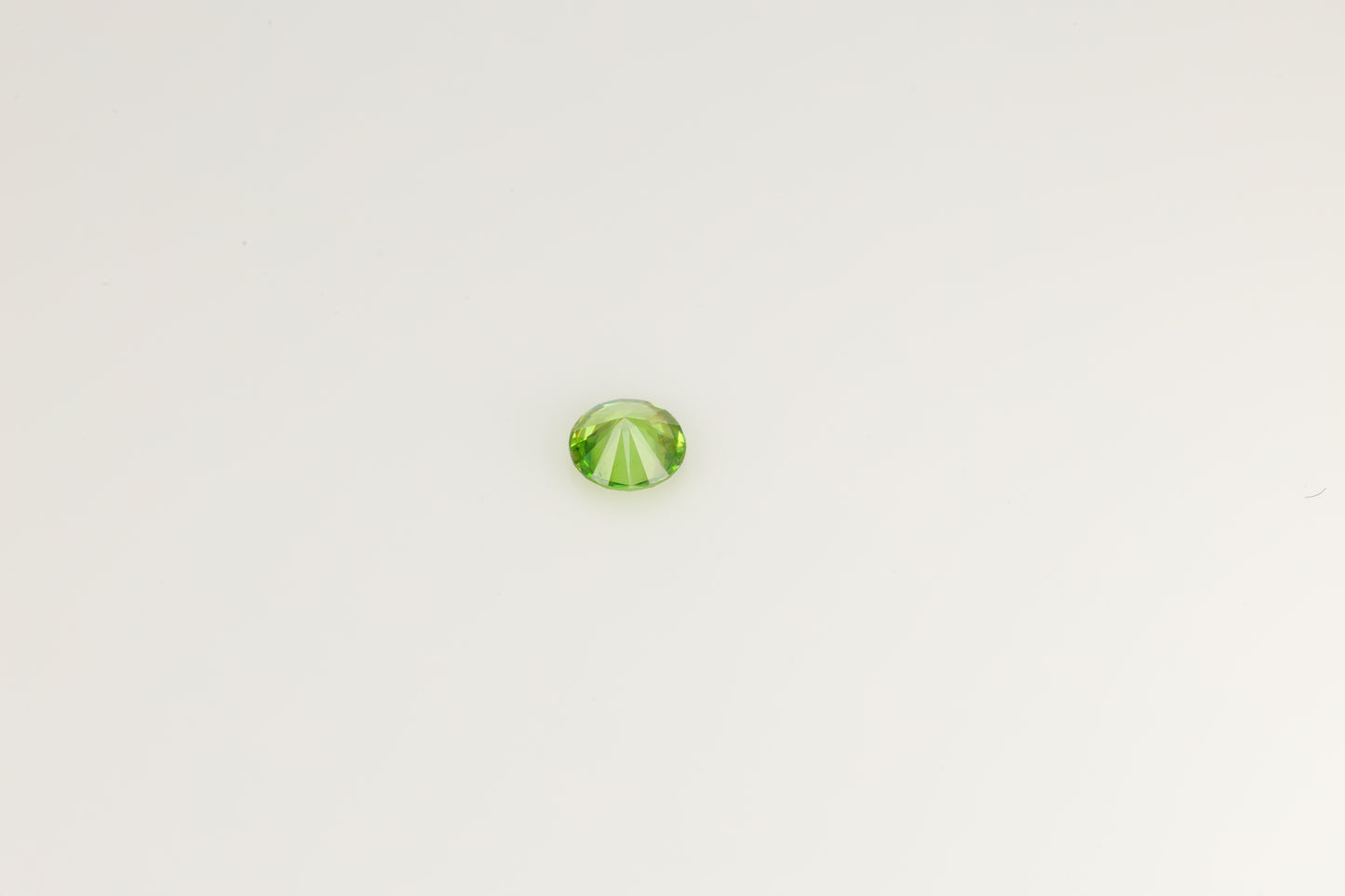 0.24 ct Faceted Russian demantoid garnet