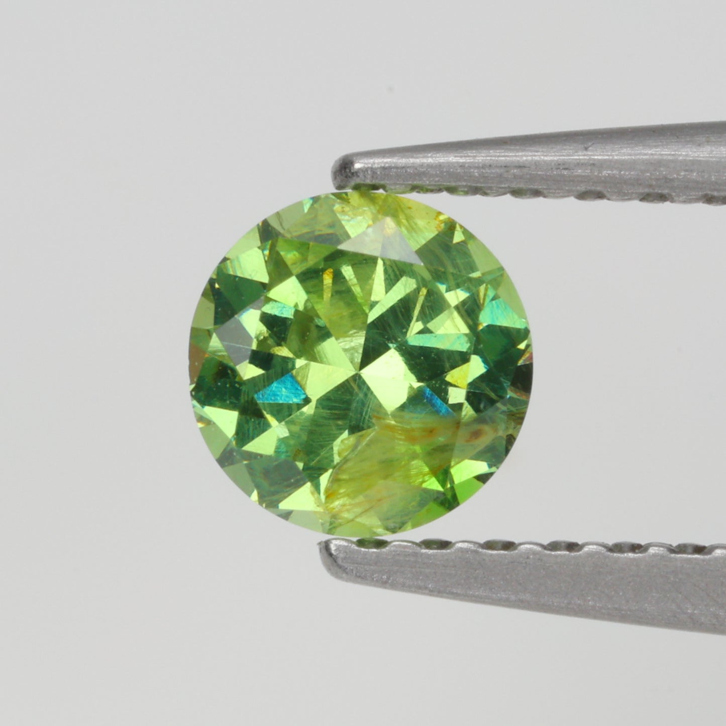 0.48 ct, Faceted Russian demantoid garnet