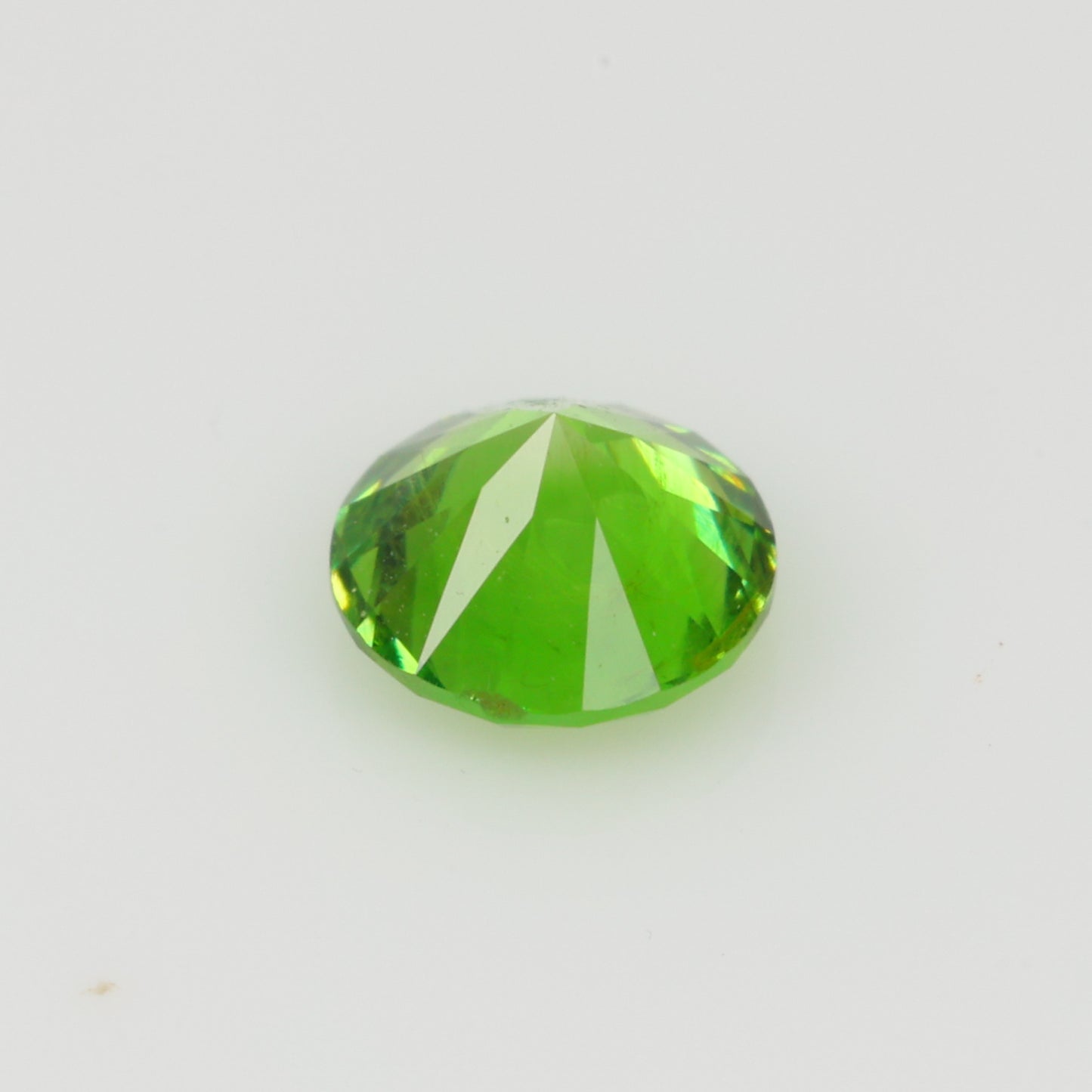 0.34 ct, Faceted Russian demantoid garnet high dispersion