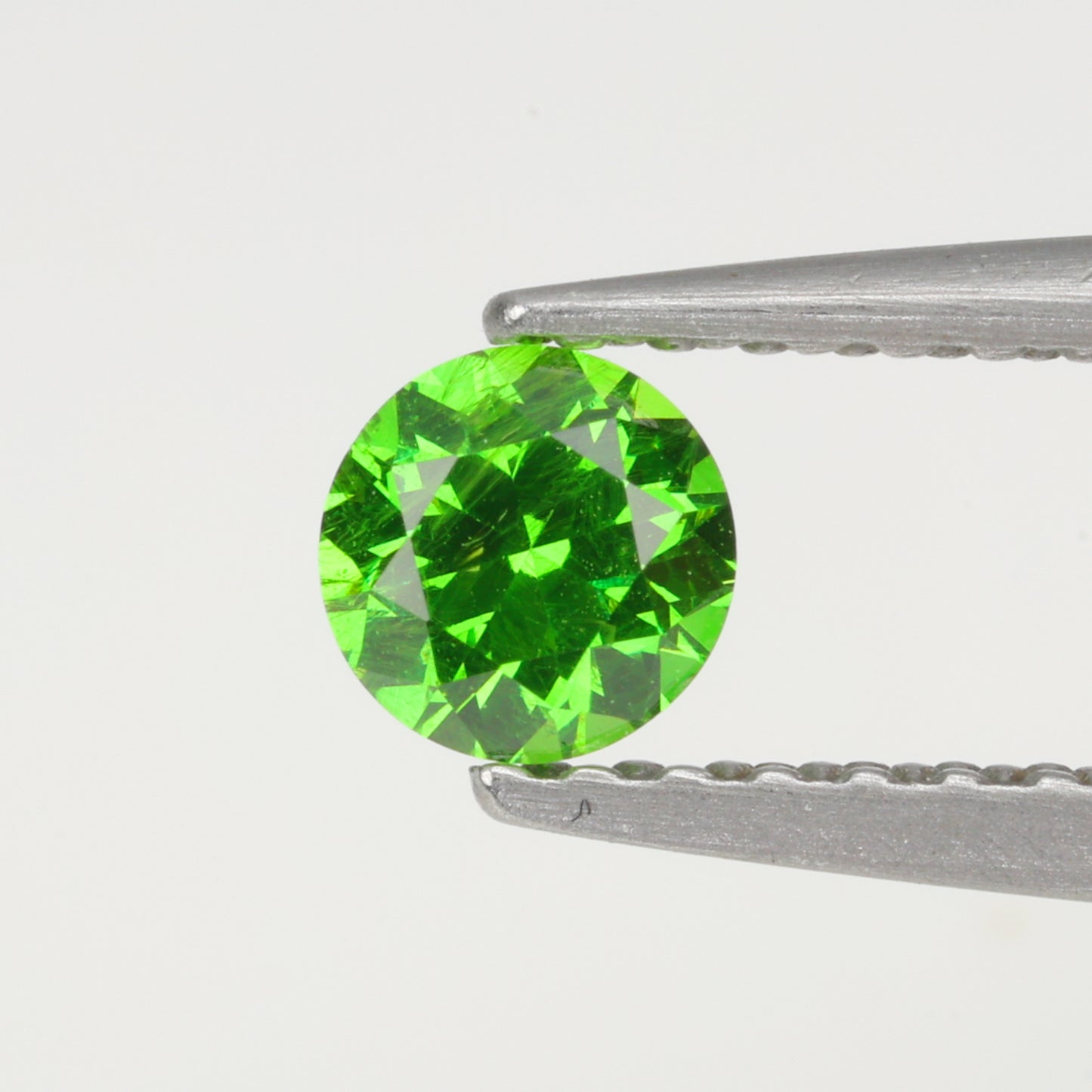 0.3 ct, Faceted Russian demantoid garnet high dispersion