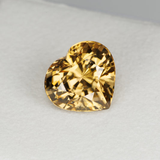 6.05 cts, Facted yellow zircon heart shape, perfect cut