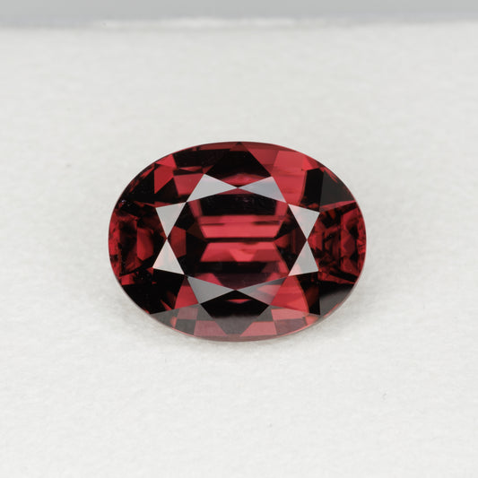 7.08 cts, Faceted oval red zircon