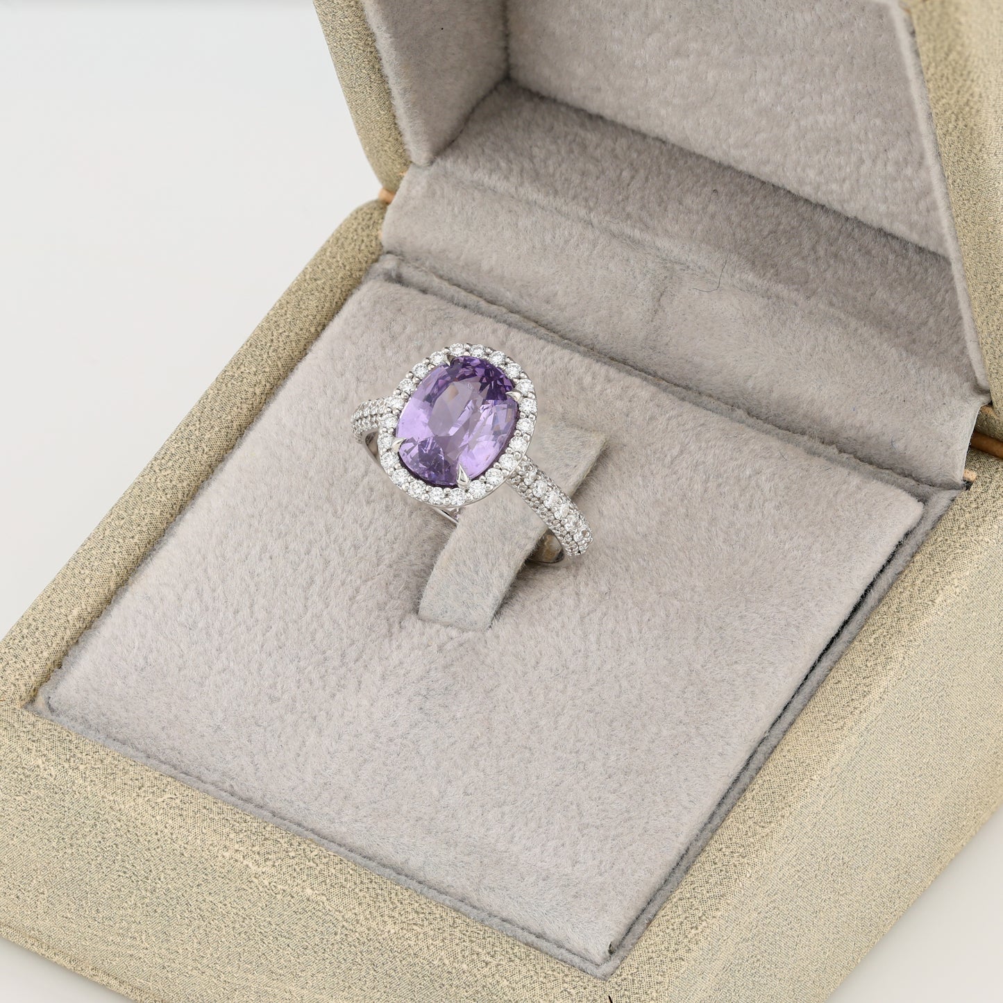 Faceted lavender spinel 18K white golden ring with diamonds
