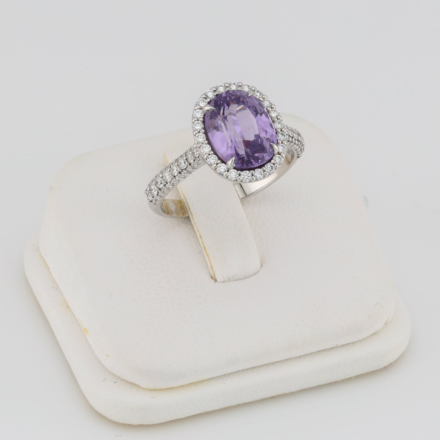 Faceted lavender spinel 18K white golden ring with diamonds