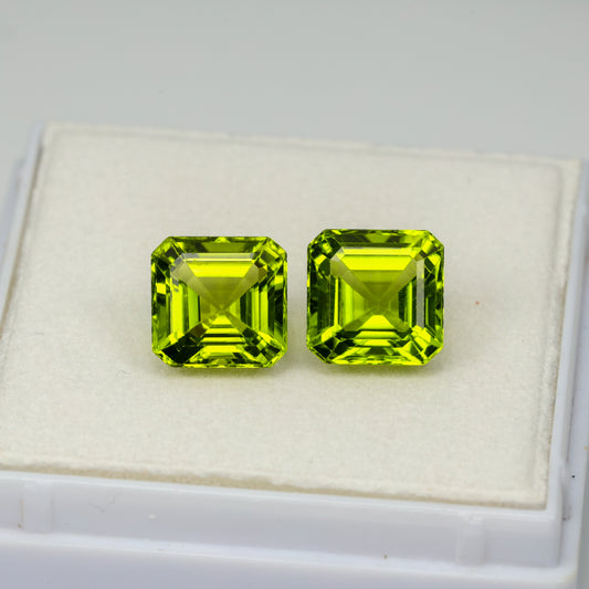 Faceted asher cut peridot pair, 5.45 cts