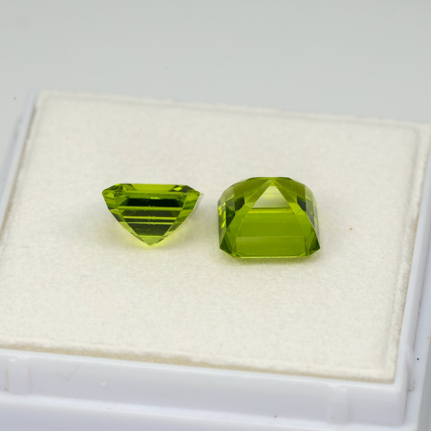 Faceted asher cut peridot pair, 5.45 cts
