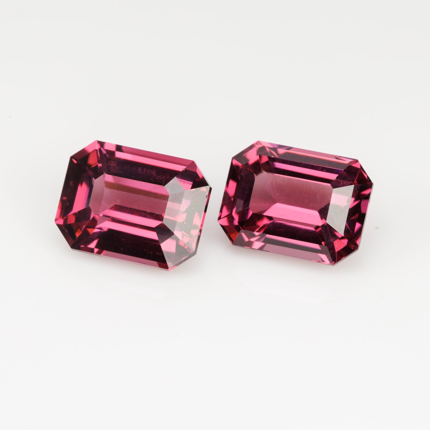 Faceted octagon pink garnet pair, 8.1 cts