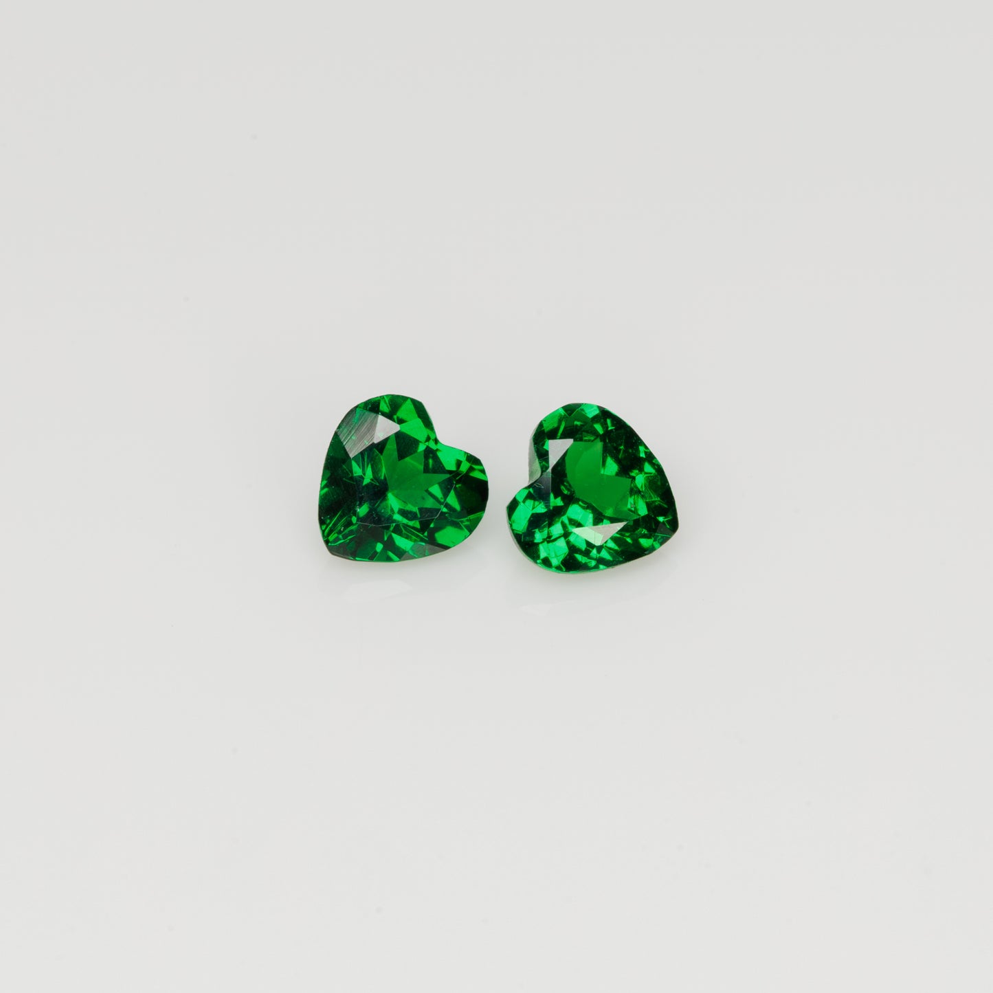 Tsavorite garnet heart shape pair, 0.61 ct