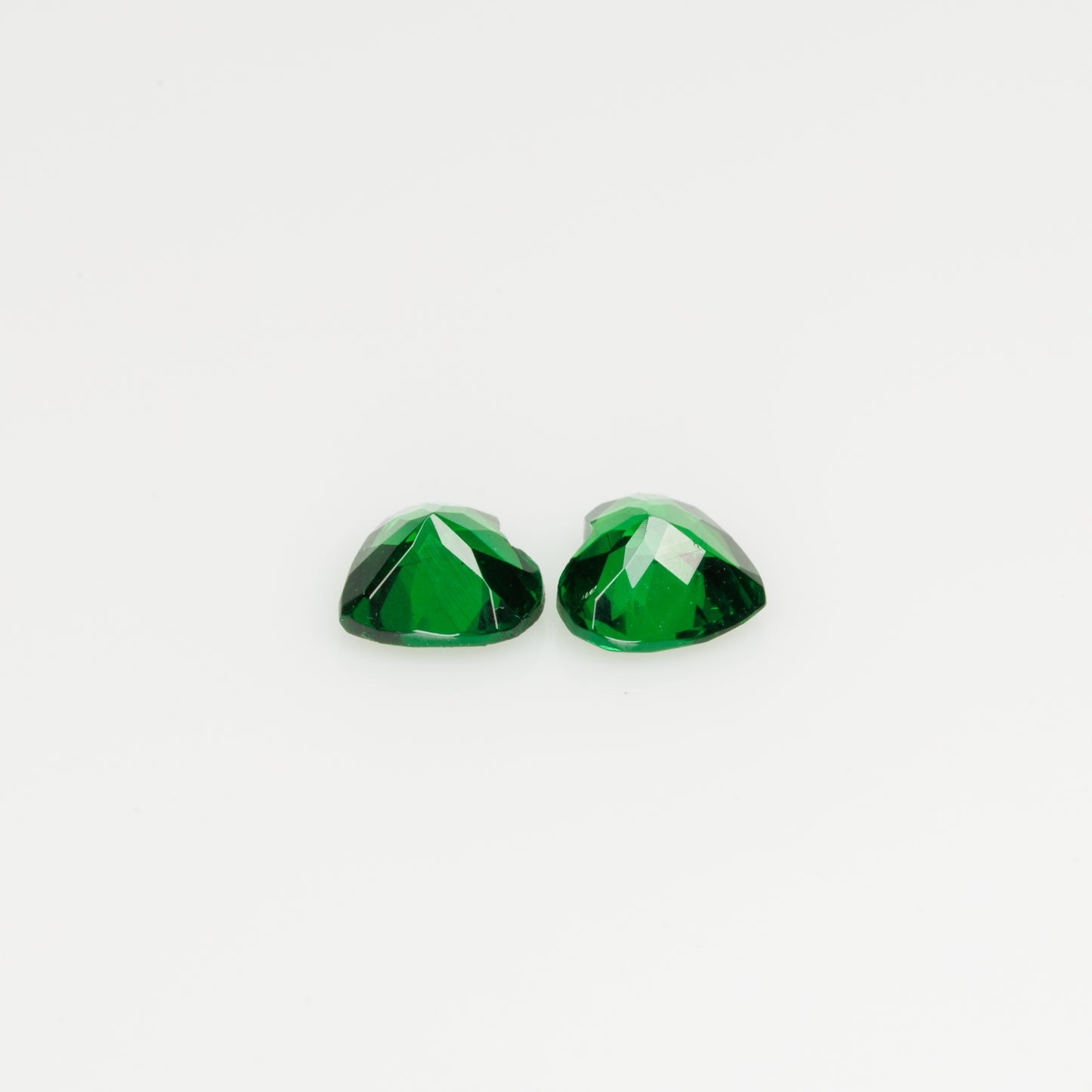Tsavorite garnet heart shape pair, 0.61 ct