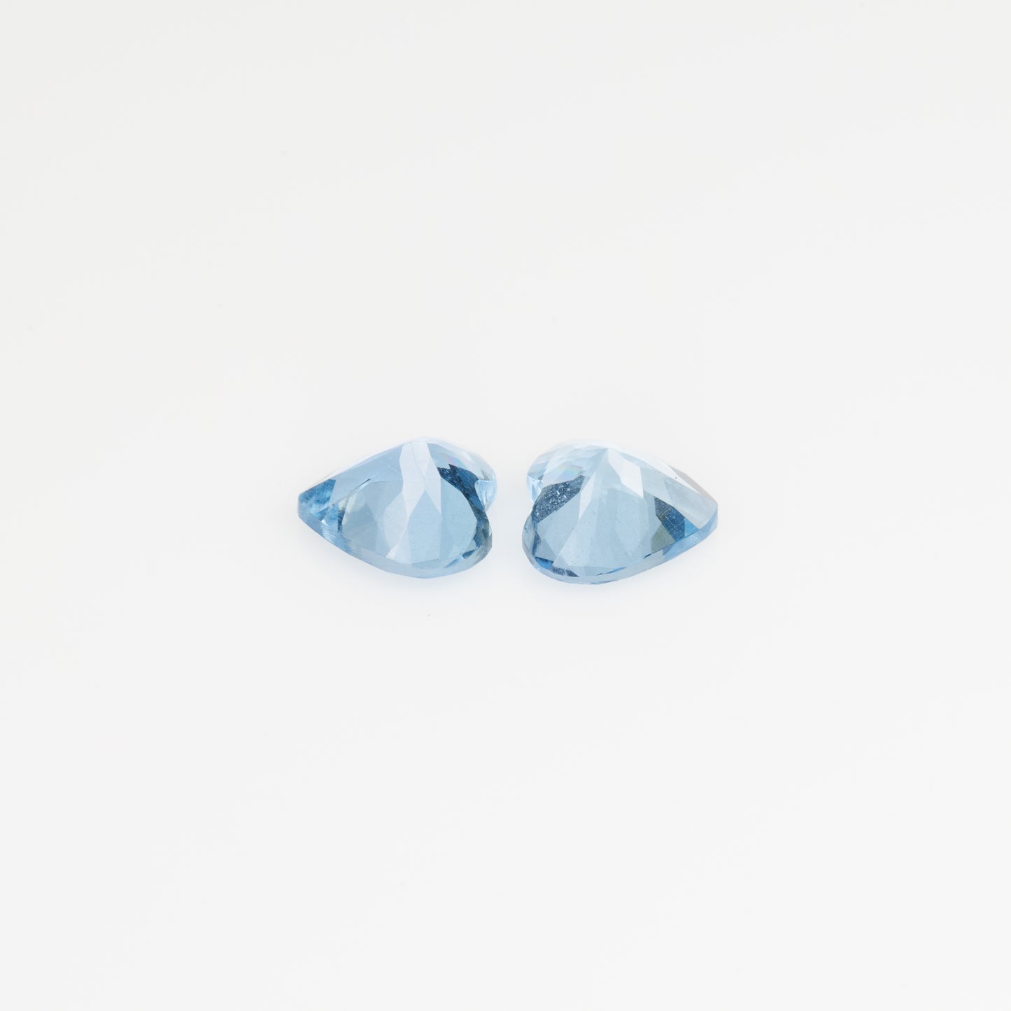 Aquamarine heart shape pair, 0.73 cts