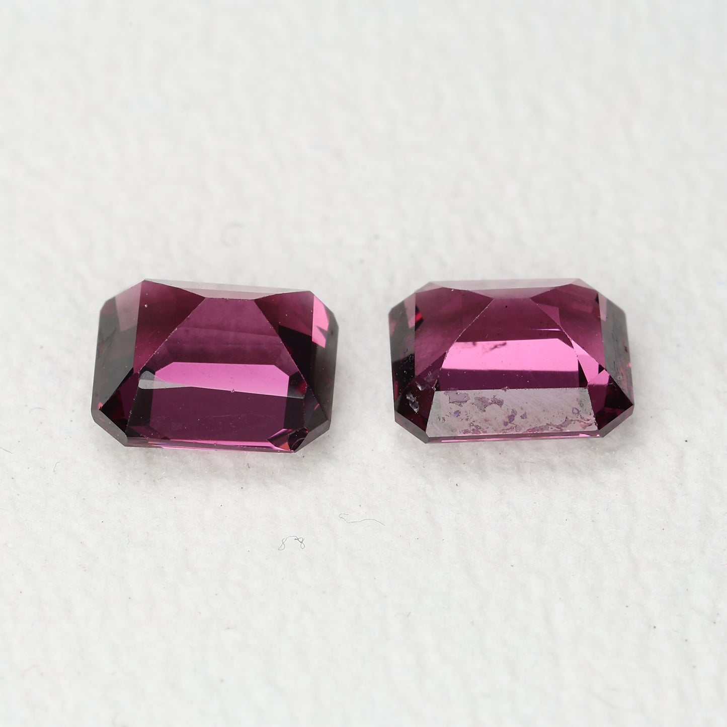 Faceted rhodolite garnet pair