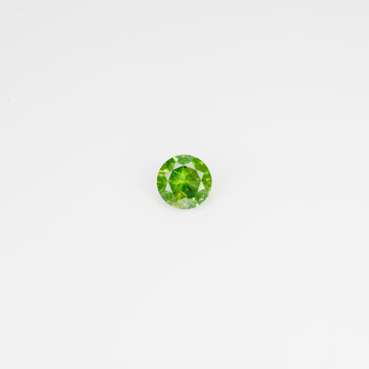 0.44 ct, Faceted Russian Demantoid with bissolite inclusions
