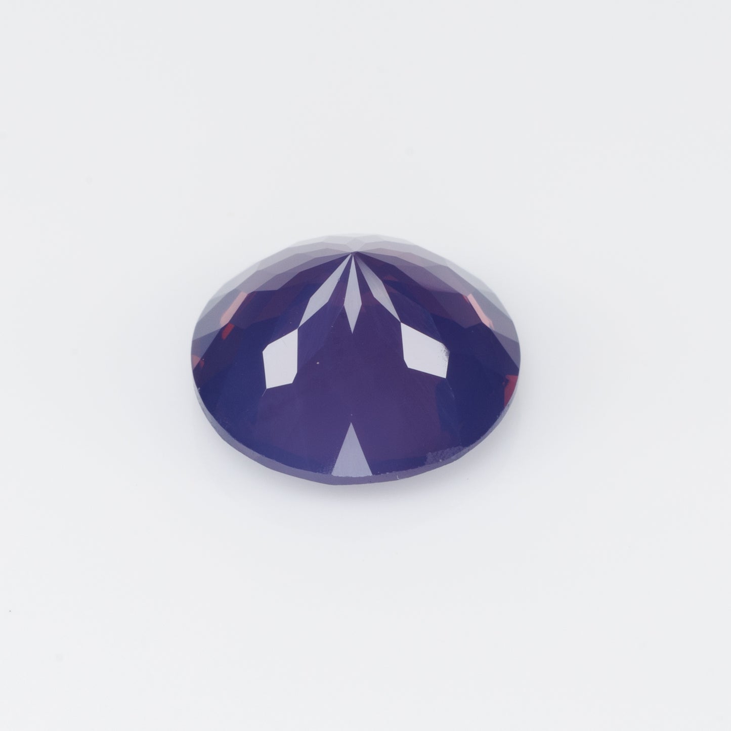 3.96 cts, Pinkish purple milky faceted round spinel, very unusual color