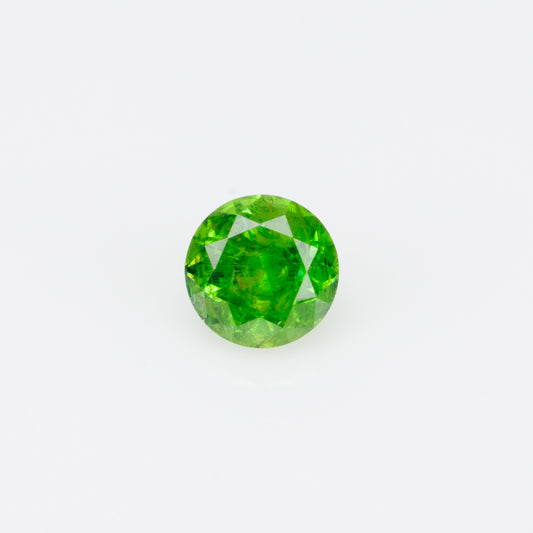 0.22 ct, Russian demantoid garnet with bissolite inclusions