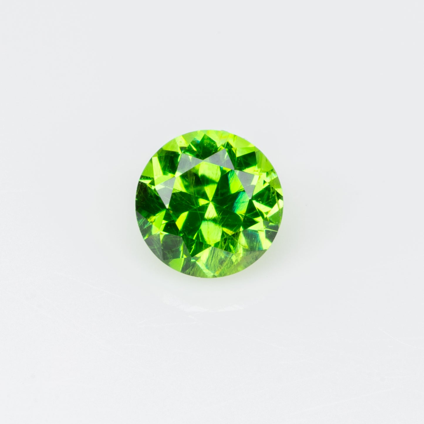 0.17 ct, Vivid green faceted Russian demantoid garnet