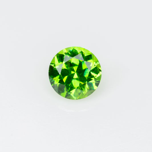 0.17 ct, Vivid green faceted Russian demantoid garnet