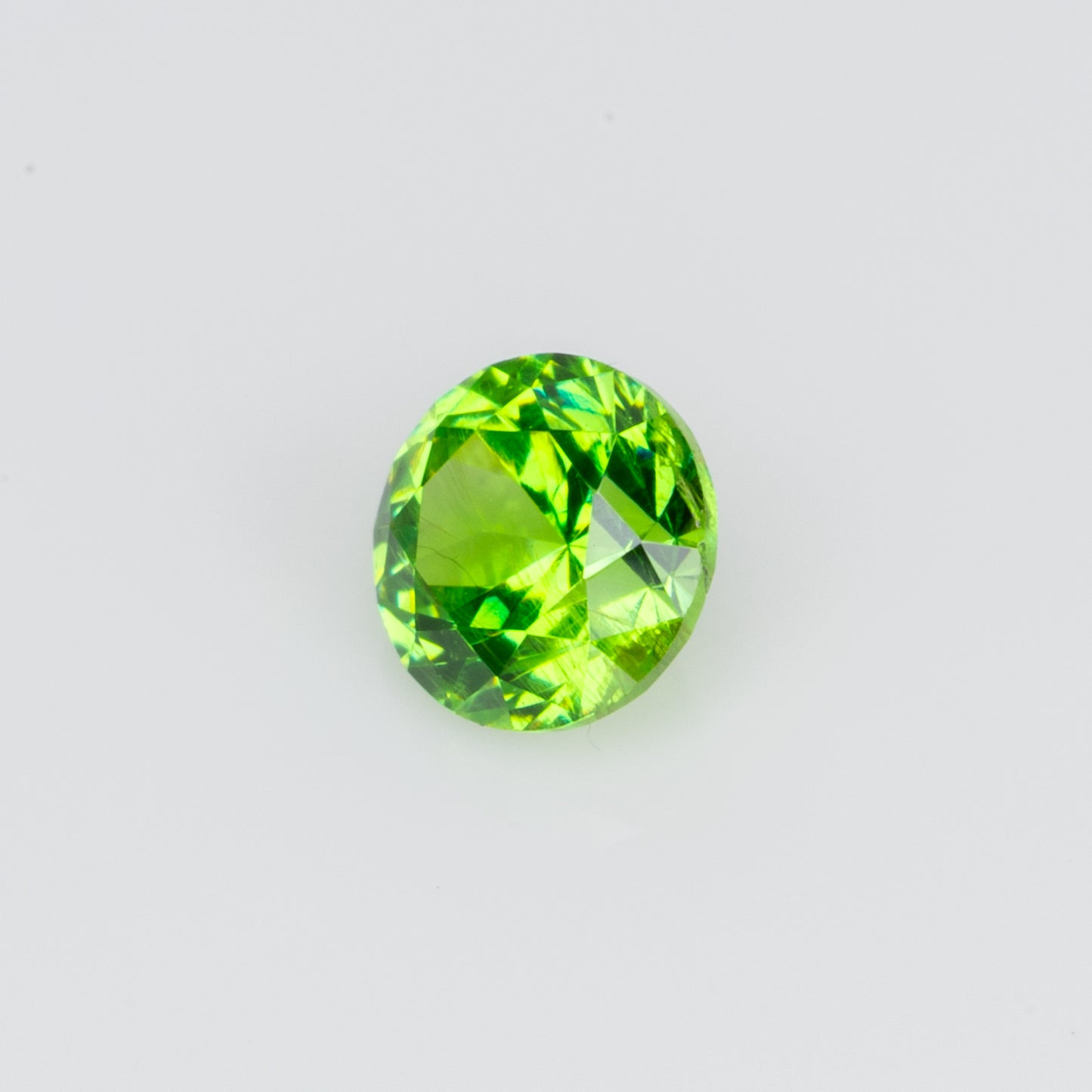 0.17 ct, Vivid green faceted Russian demantoid garnet