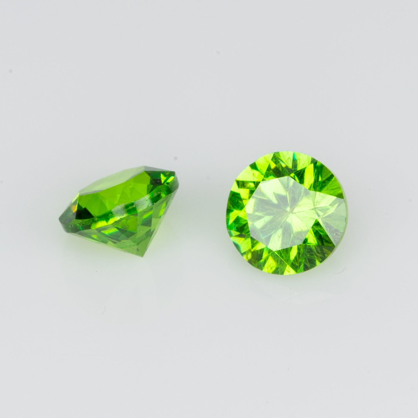 0.27 ct, Faceted vivid green russian demantoid pair