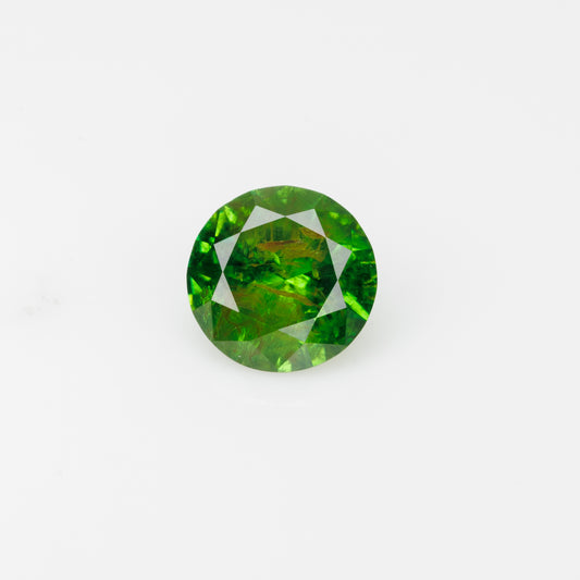 0.58 ct, Faceted Russian demantoid garnet