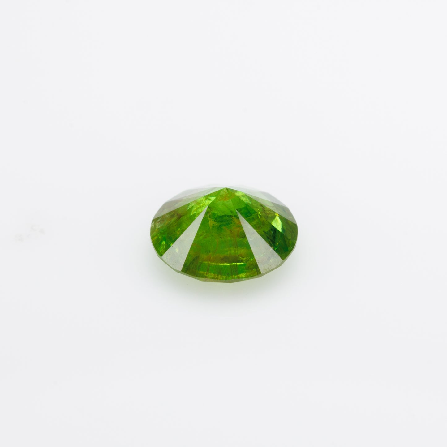 0.58 ct, Faceted Russian demantoid garnet