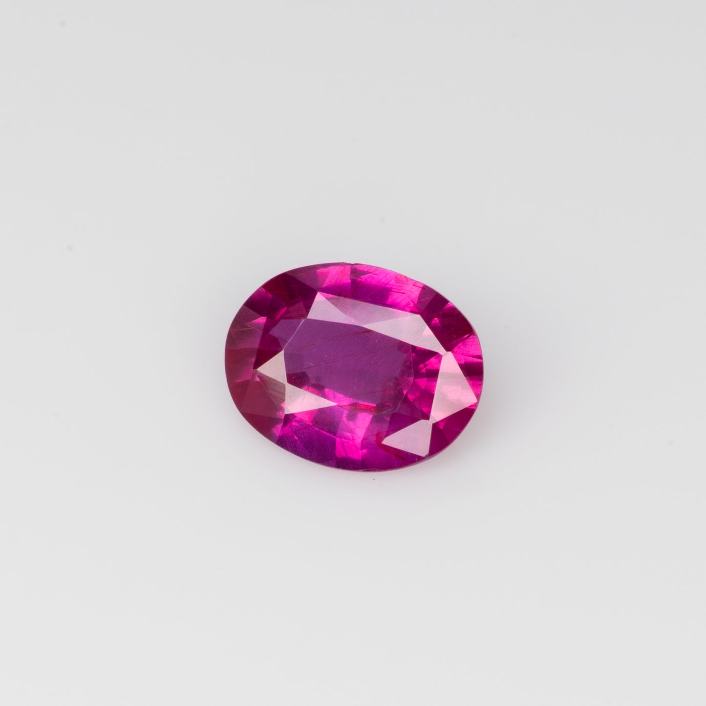 0.66 сt, Vivid red-pink unheated oval ruby