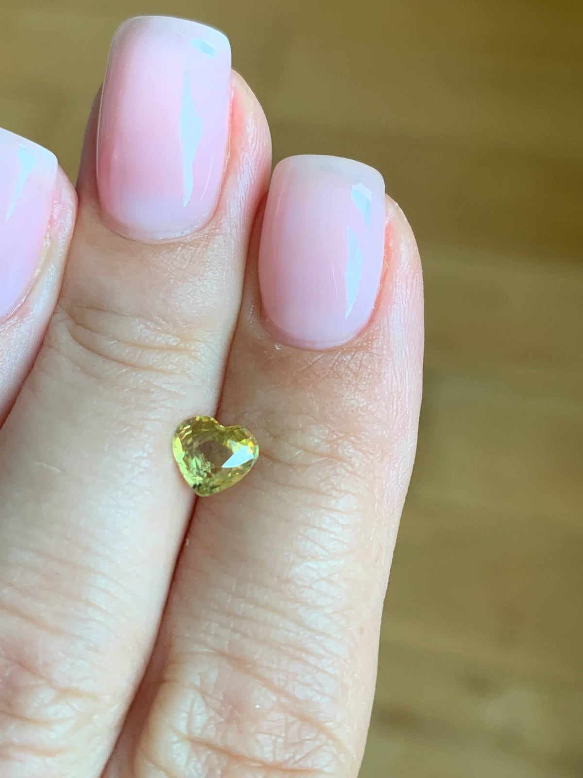 0.92 ct, Faceted vivid yellow sphene