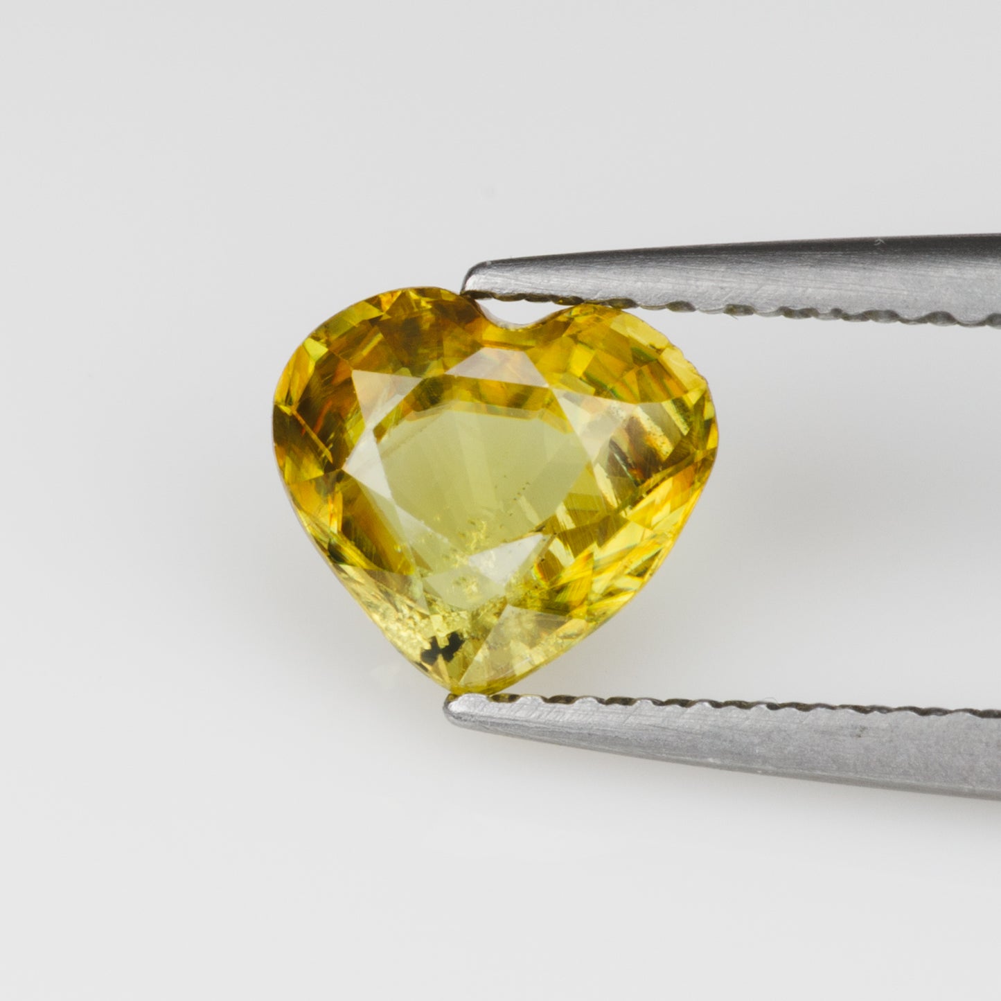 0.92 ct, Faceted vivid yellow sphene