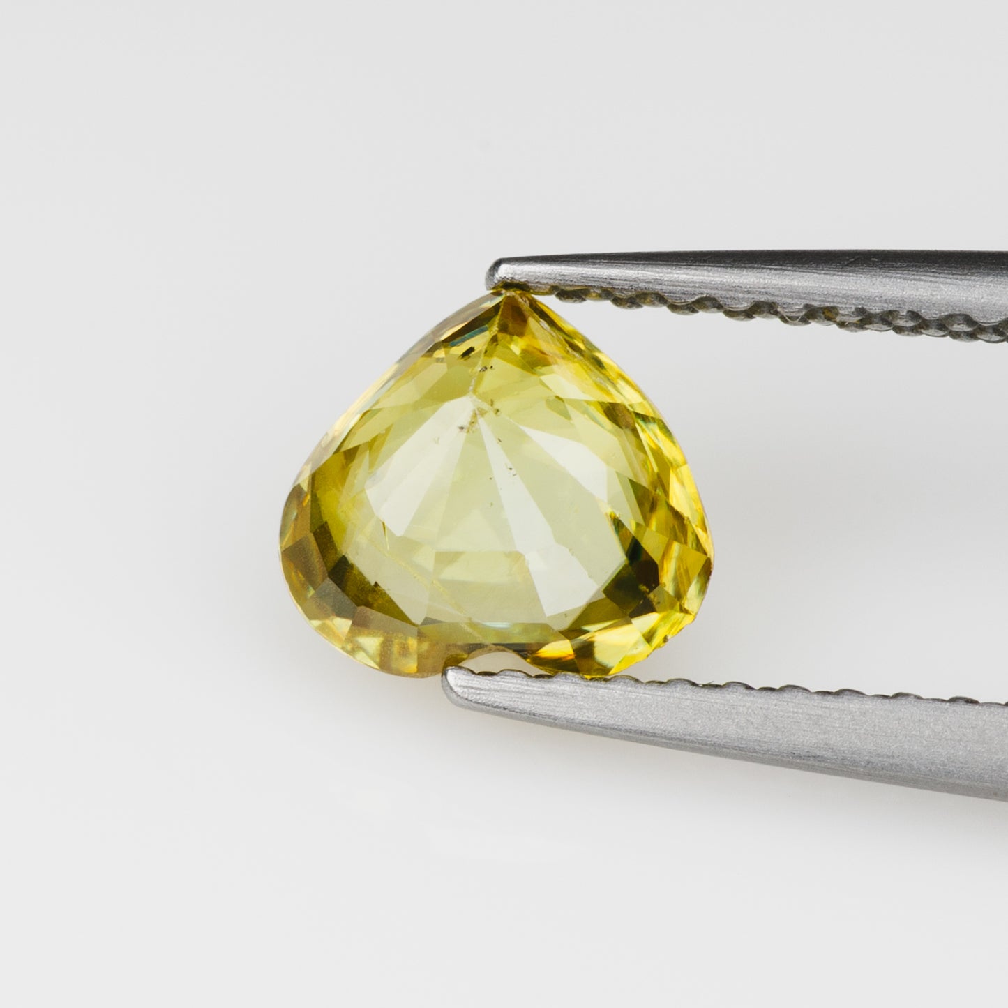 0.92 ct, Faceted vivid yellow sphene