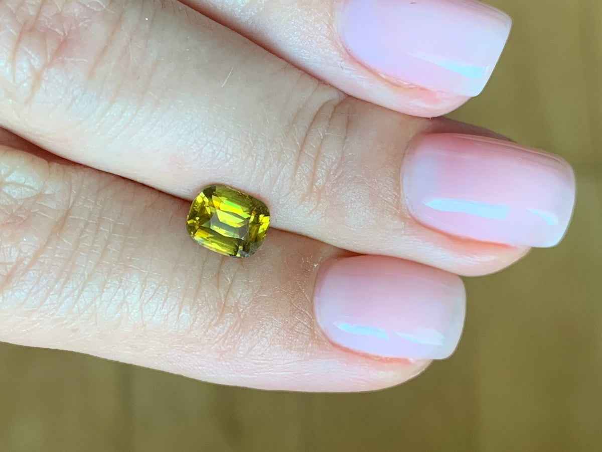 1.6 cts, Faceted vivid yellow sphene
