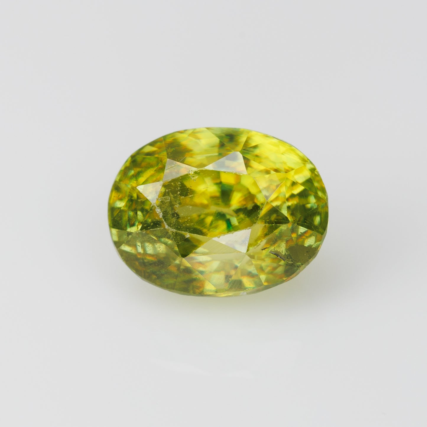 1.22 cts, Faceted yellowish green sphene