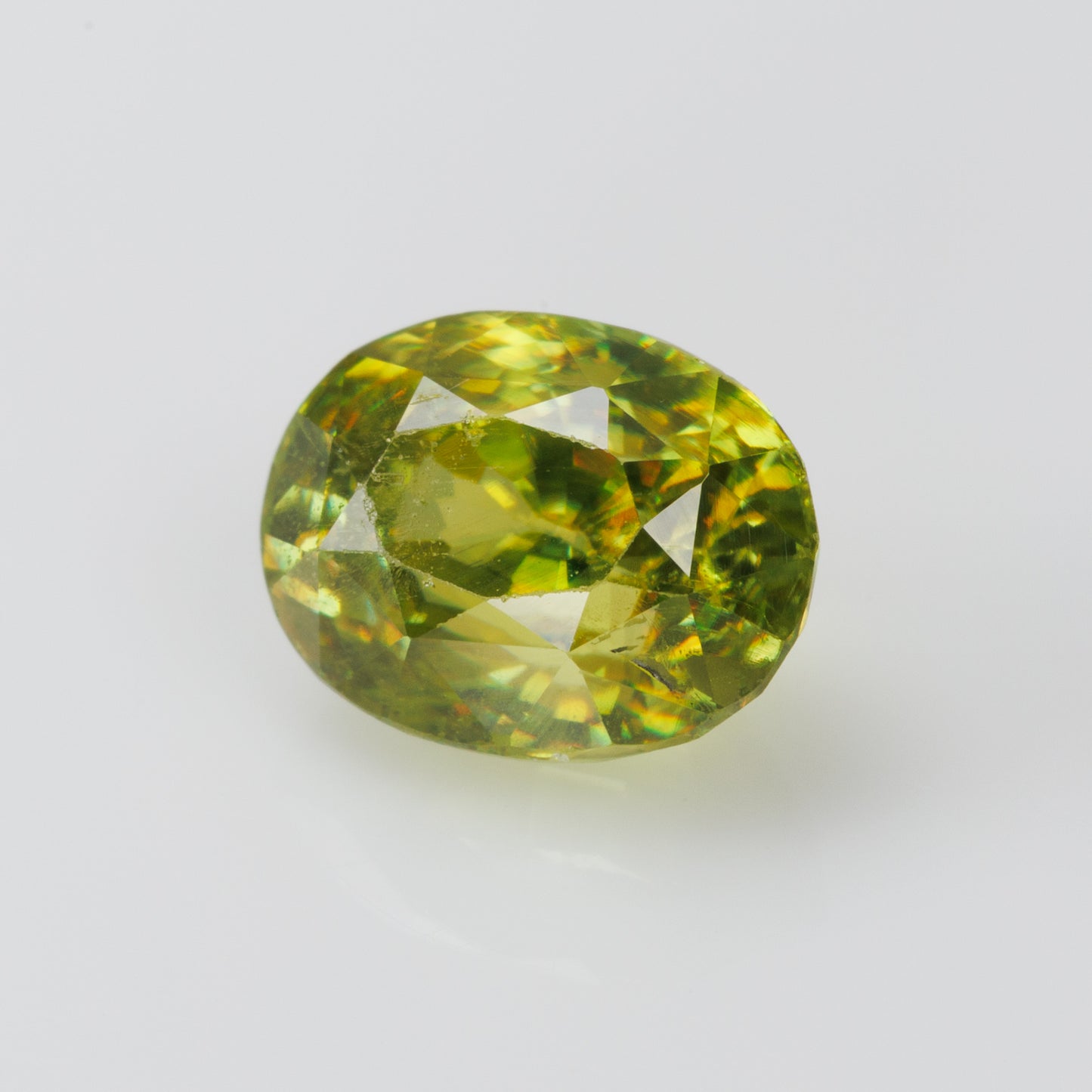1.22 cts, Faceted yellowish green sphene