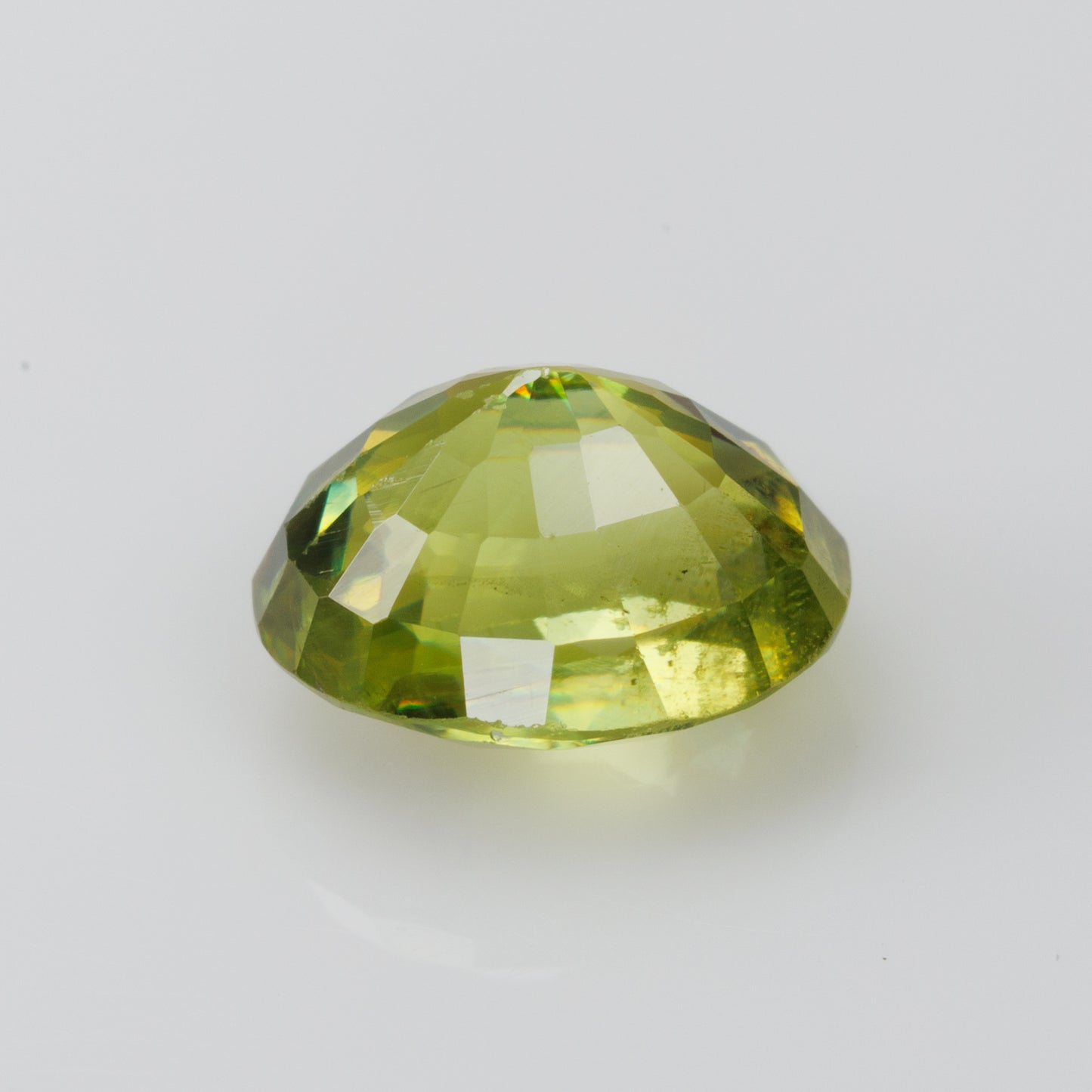 1.22 cts, Faceted yellowish green sphene