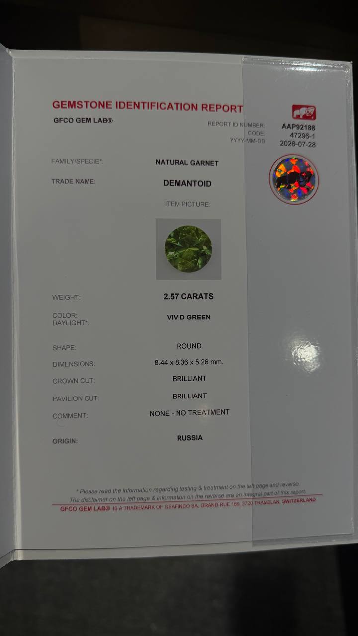2.57 ct, Rare Certified Russian faceted vivid green demantoid garnet