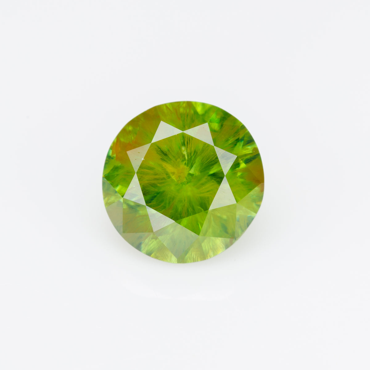 1.15 CTs, Faceted Russian demantoid garnet with horsetail inclusion