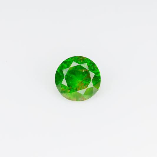 0.38 ct, Faceted Russian demantoid garnet with byssolite  inclusions