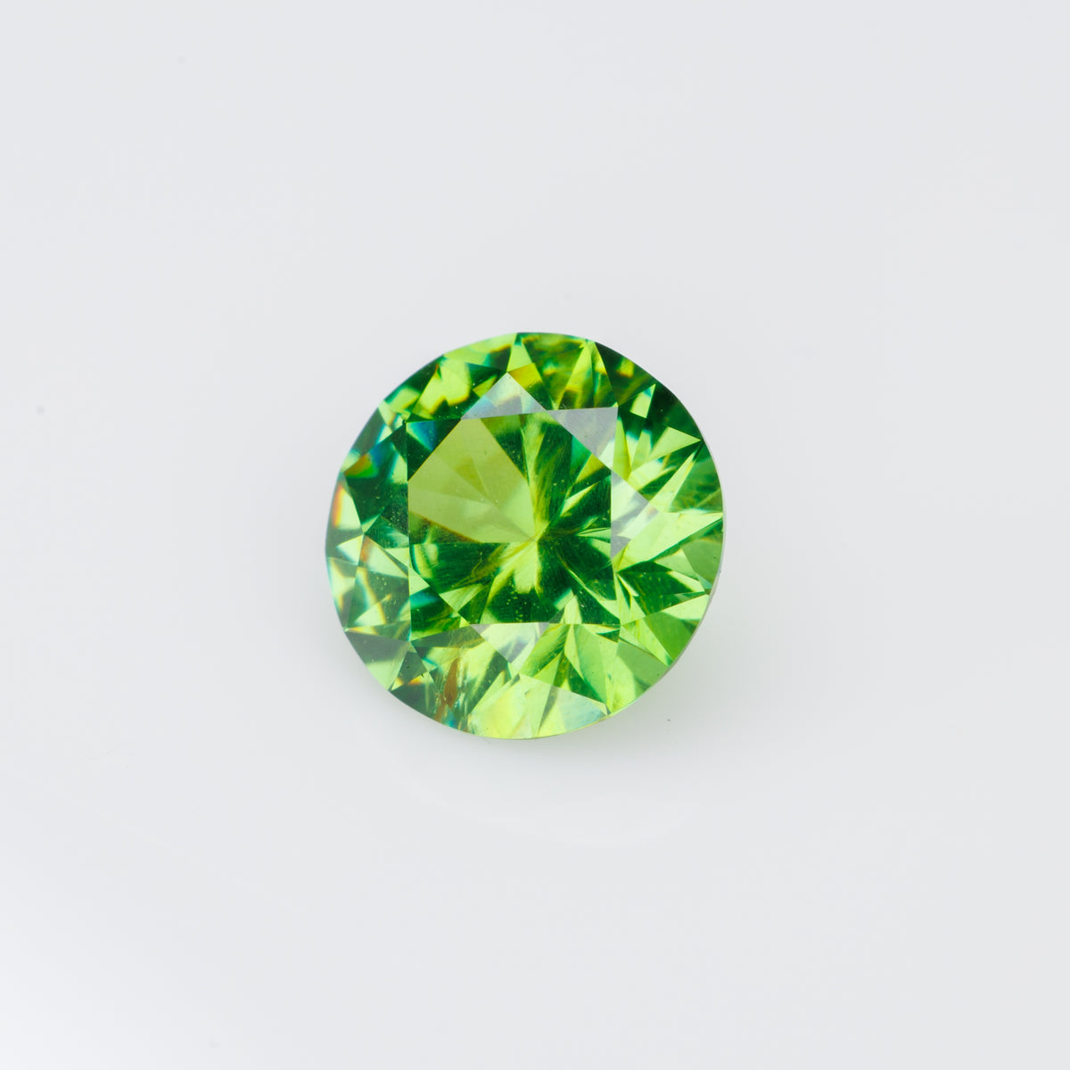 0.76 ct, Faceted Russian demantoid garnet with high dispersion