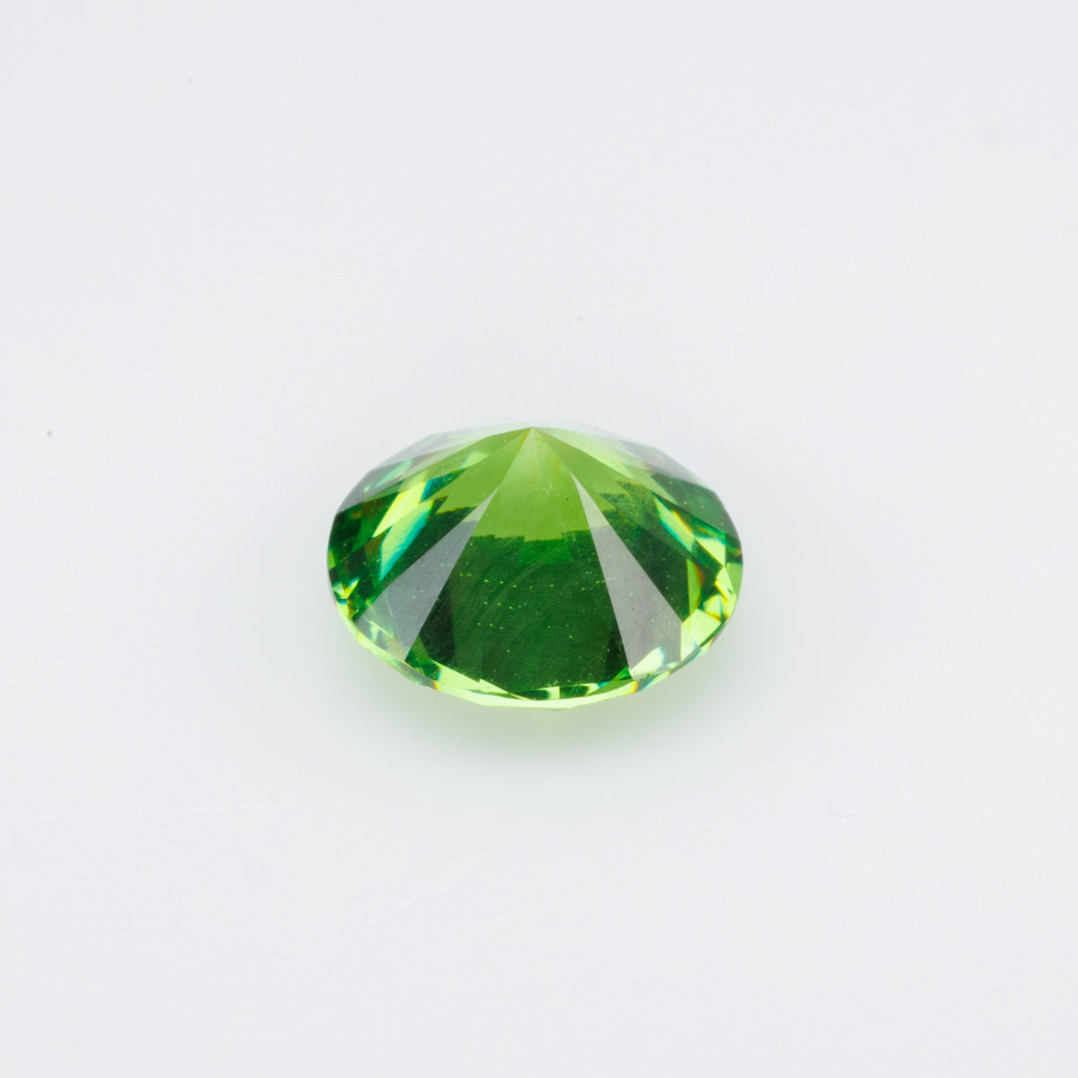 0.76 ct, Faceted Russian demantoid garnet with high dispersion